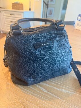 Status Anxiety last mountains pebbled black leather bag